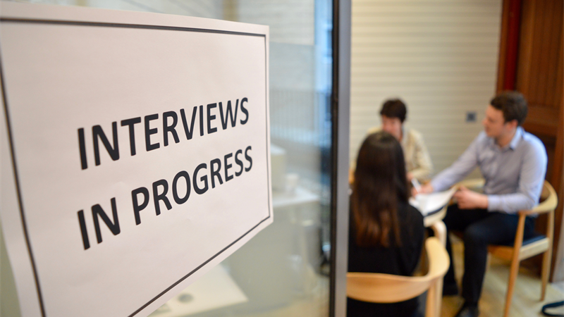 Interview in progress sign